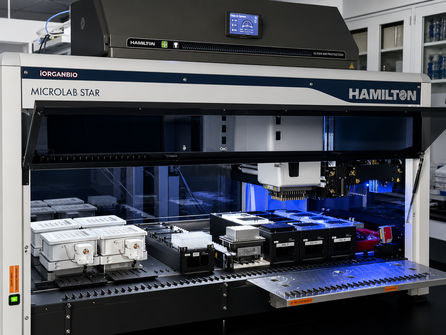 iOrganBio's Hamilton Microlab STAR liquid-handling robot with plates, tip racks, and heater shakers on its deck.